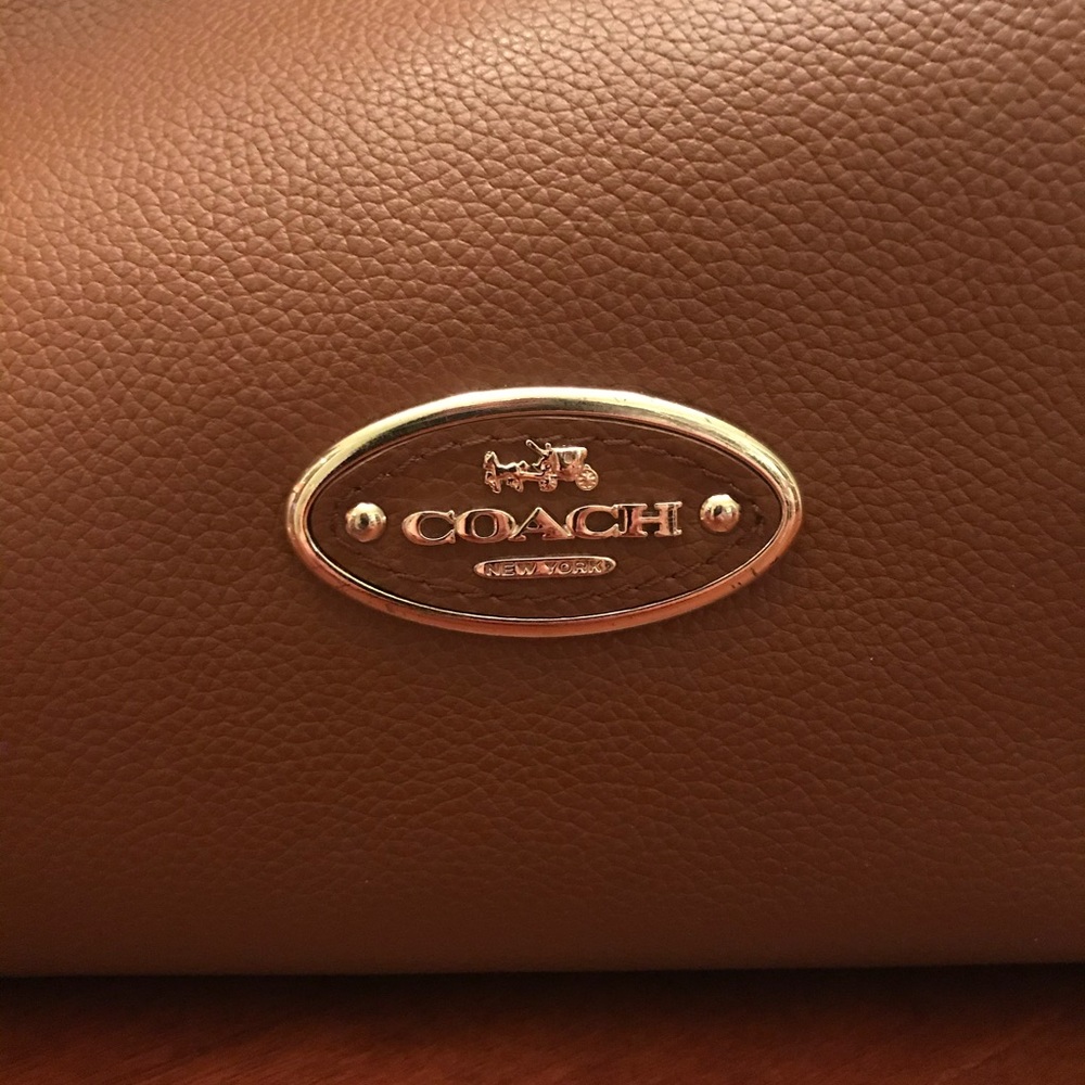 Brown leather coach bag barely used!